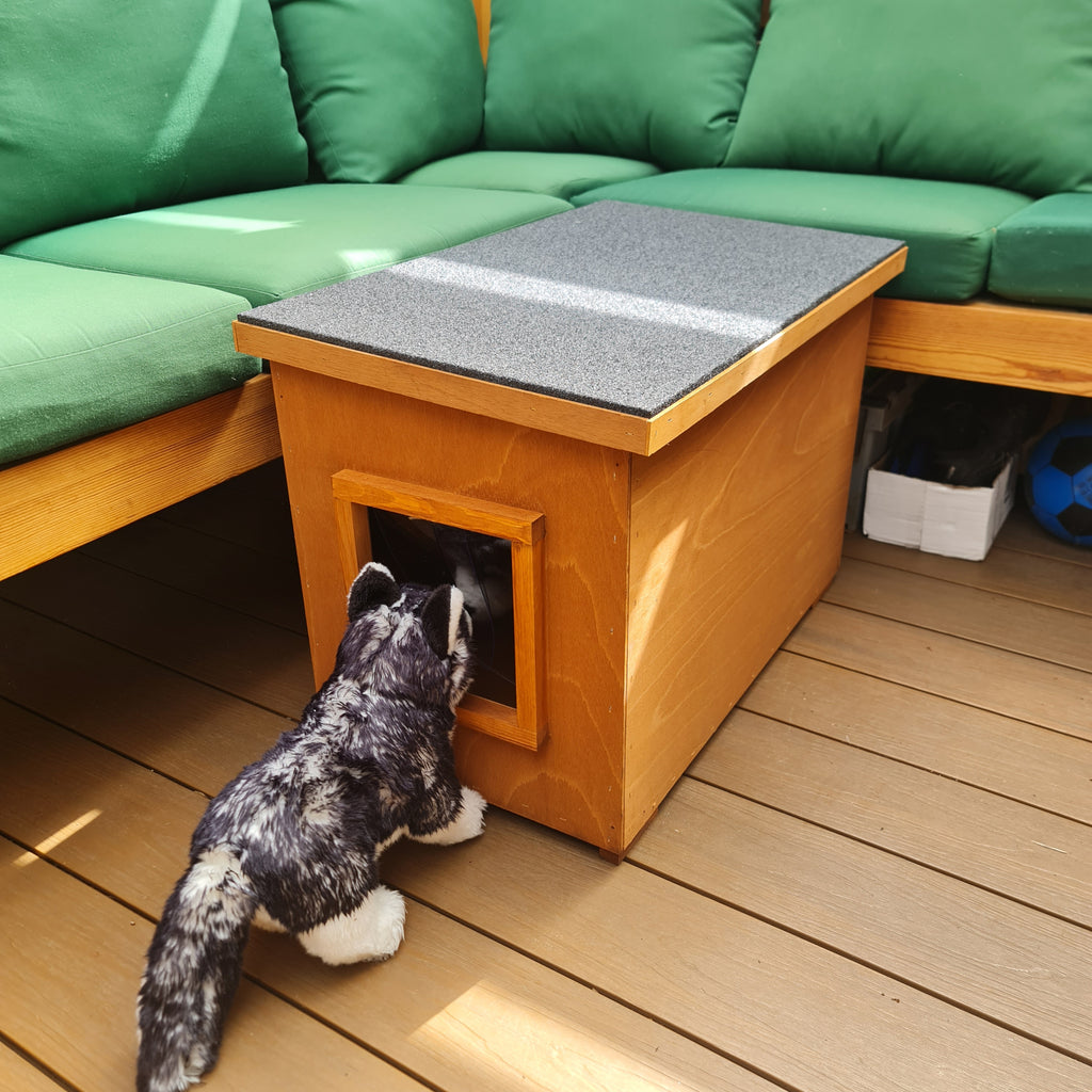 Front view of extra high outdoor cat house made of wood